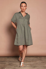 Model Katie wearing size 10 of the Linen Throw On Dress in colour Olive (Green), from the front, showing the whole outfit