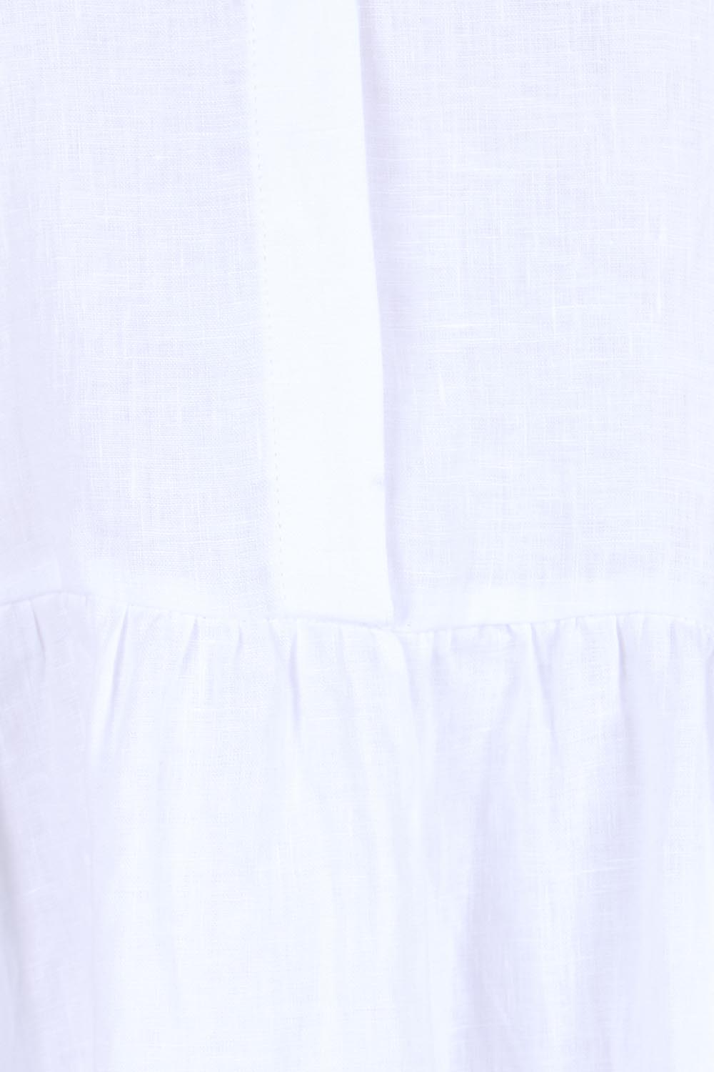 Product shot of the Linen Throw On Dress – White in colour White, showing detail