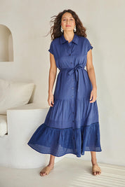 Model Tahneei wearing size 10 of the Cotton Broderie Trim Dress – Blue in colour Blue, from the front
