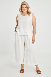 Model Keeara wearing size 16 of the Linen Drawstring Pants in colour White (White), from the front, showing the whole outfit