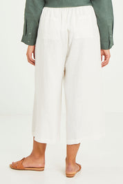 Model Terri-Leigh wearing size 14 of the Linen Drawstring Pants in colour White (White), from the back