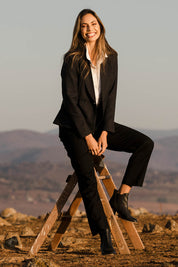 Model Amanda wearing size 10 of the Classic Wool Blazer in colour Fossil (Black), from the front, showing the whole outfit
