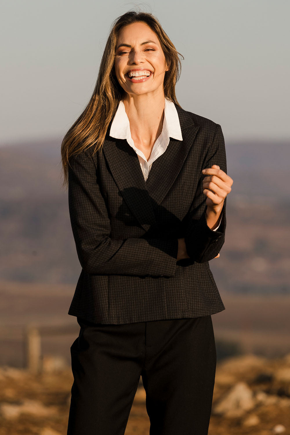 Model Amanda wearing size 10 of the Classic Wool Blazer in colour Fossil (Black), from the front, showing the whole outfit