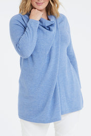 Model Jess wearing size L of the Wool Cashmere Crossover Tunic in colour Bluemarl (Blue), from the front, cropped image