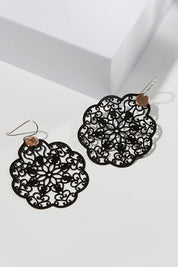A model wearing size OneSize of the Filigree Earring in colour Black (Black), from the front, showing the whole outfit