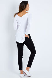 Model Amanda wearing the Ami Skinny Jean in colour Black (Black), from the back