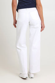 Model Madeline wearing the Teresa Wide Leg Jeans in colour Opticwhite (White), from the back