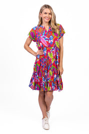 Model Genericm wearing size sample of the Leela Cotton Dress - Coral in colour Coral, from the front