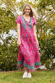 Model Genericm wearing size sample of the Zola Cotton Maxi Dress - Fuchsia in colour Fuchsia, from the front