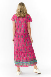 Model Genericm wearing size sample of the Zola Cotton Maxi Dress - Fuchsia in colour Fuchsia, from the front