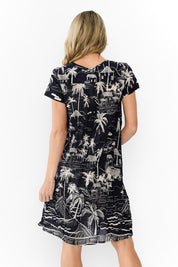 Model Genericm wearing size sample of the Nicola Cotton Dress - Navy in colour Navy, from the back