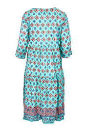Product shot of the Rebecca Cotton Tie Neck Dress in colour Diamond1 (Blue), from the back