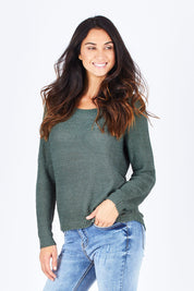 Model Gemma wearing the Geena Xo L/s Pullover Knit in colour BalsamGree (Green), from the front, cropped image