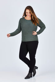 Model Sophie wearing the Geena Xo L/s Pullover Knit in colour BalsamGree (Green), from the front, showing the whole outfit