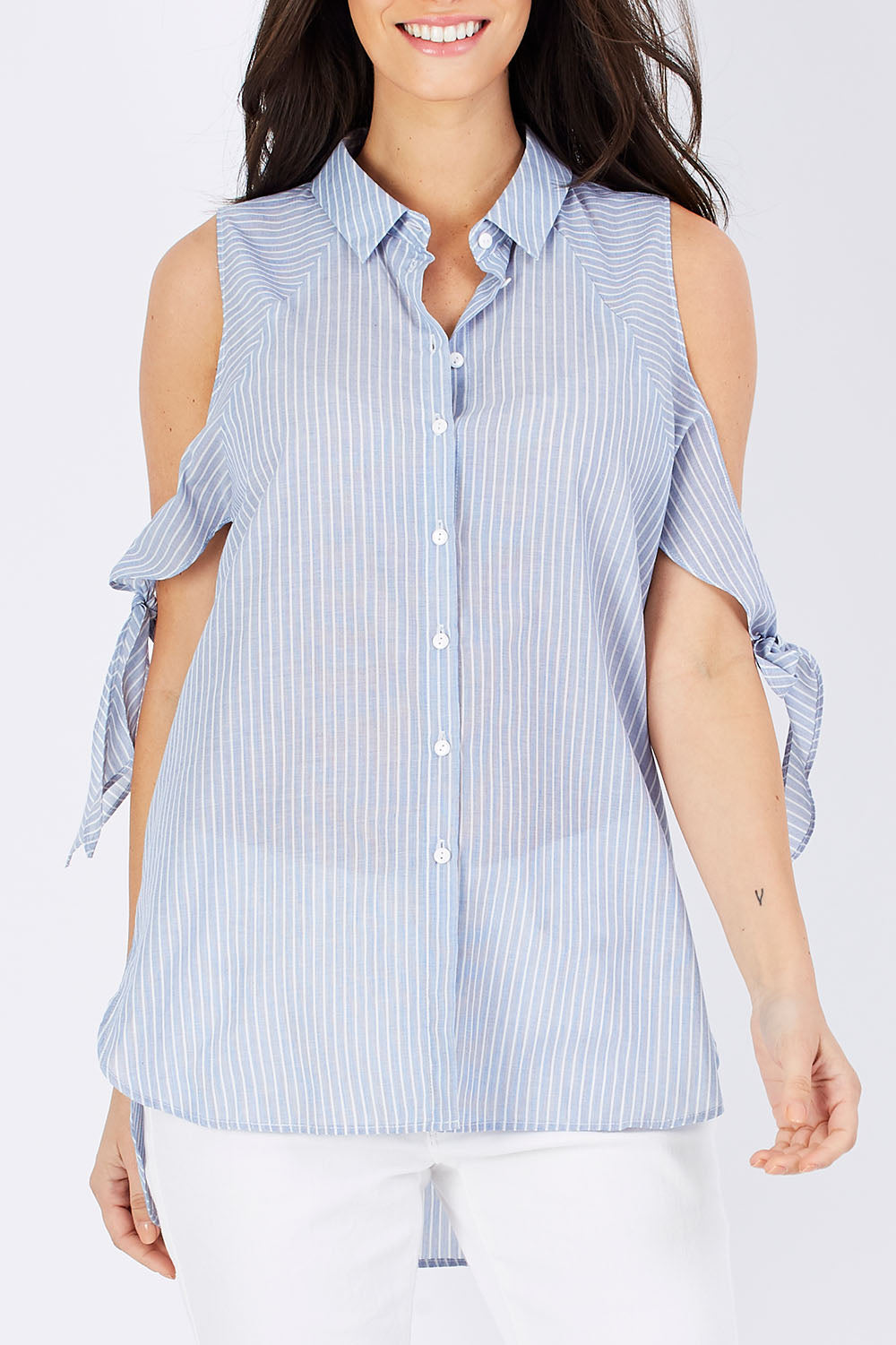 Model Georgia wearing size S of the Cooks Shirt in colour Stripes (White), from the front, cropped image