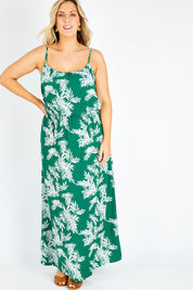Model Jess wearing the Strap Maxi Dress in colour Summerpalm (Green), from the front, showing the whole outfit