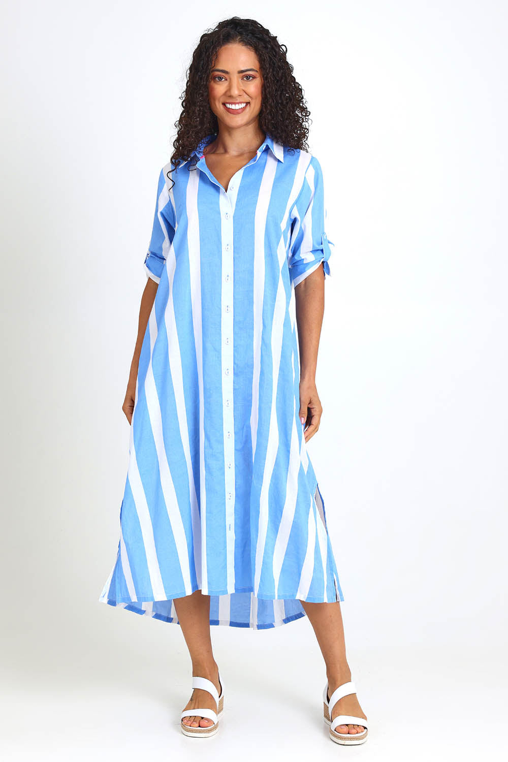 Model Pamelar wearing size 10 of the Long Buttonthrough Dress – Blue in colour Blue, from the front