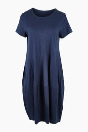 Product shot of the Essentials Organic Cotton Bubble Dress in colour Navy (Blue), from the front