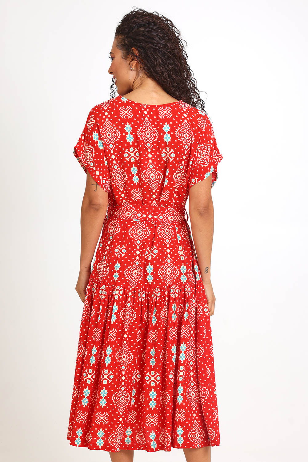 Model Pamelar wearing size 10 of the V-Neck Button Through Dress – Print in colour Print, from the front