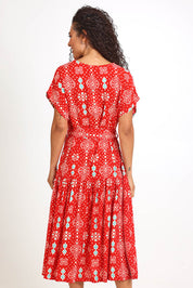 Model Pamelar wearing size 10 of the V-Neck Button Through Dress – Print in colour Print, from the front