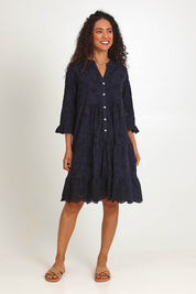Model Pamelar wearing size 10 of the Essentials Broderie Frill Hem and Sleeves Dress - Black in colour Black, from the front