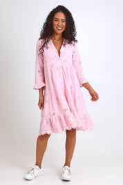 Model Pamelar wearing size 10 of the Essentials Broderie Frill Hem and Sleeves Dress - Pink in colour Pink, from the front