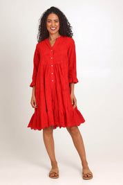 Model Pamelar wearing size 10 of the Essentials Broderie Frill Hem and Sleeves Dress - Red in colour Red, from the front