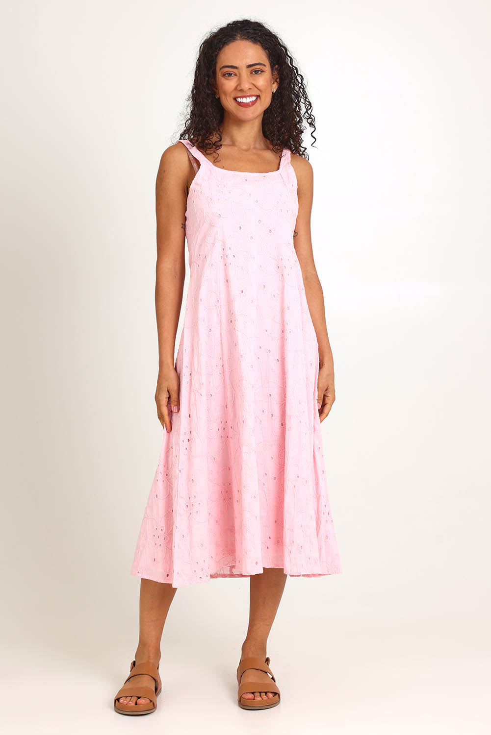 Model Pamelar wearing size 10 of the Essentials Broderie Strappy Cotton Dress - Pink in colour Pink, from the front