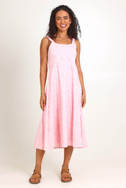 Model Pamelar wearing size 10 of the Essentials Broderie Strappy Cotton Dress - Pink in colour Pink, from the front