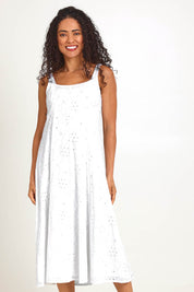 Model Pamelar wearing size 10 of the Essentials Broderie Strappy Cotton Dress - White in colour White, from the front