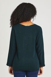 Model Ziara wearing size 10 of the Essentials Organic Cotton Boat Ls Neck Top in colour Pine (Green), from the back