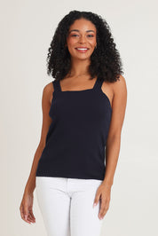 Model Ziara wearing size 10 of the Essentials Squareneck Knit Cotton Tank in colour Navy (Blue), from the front, cropped image