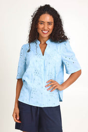 Model Pamelar wearing size 10 of the Essentials Broderie Cotton Top - Sky in colour Sky, in a cropped view