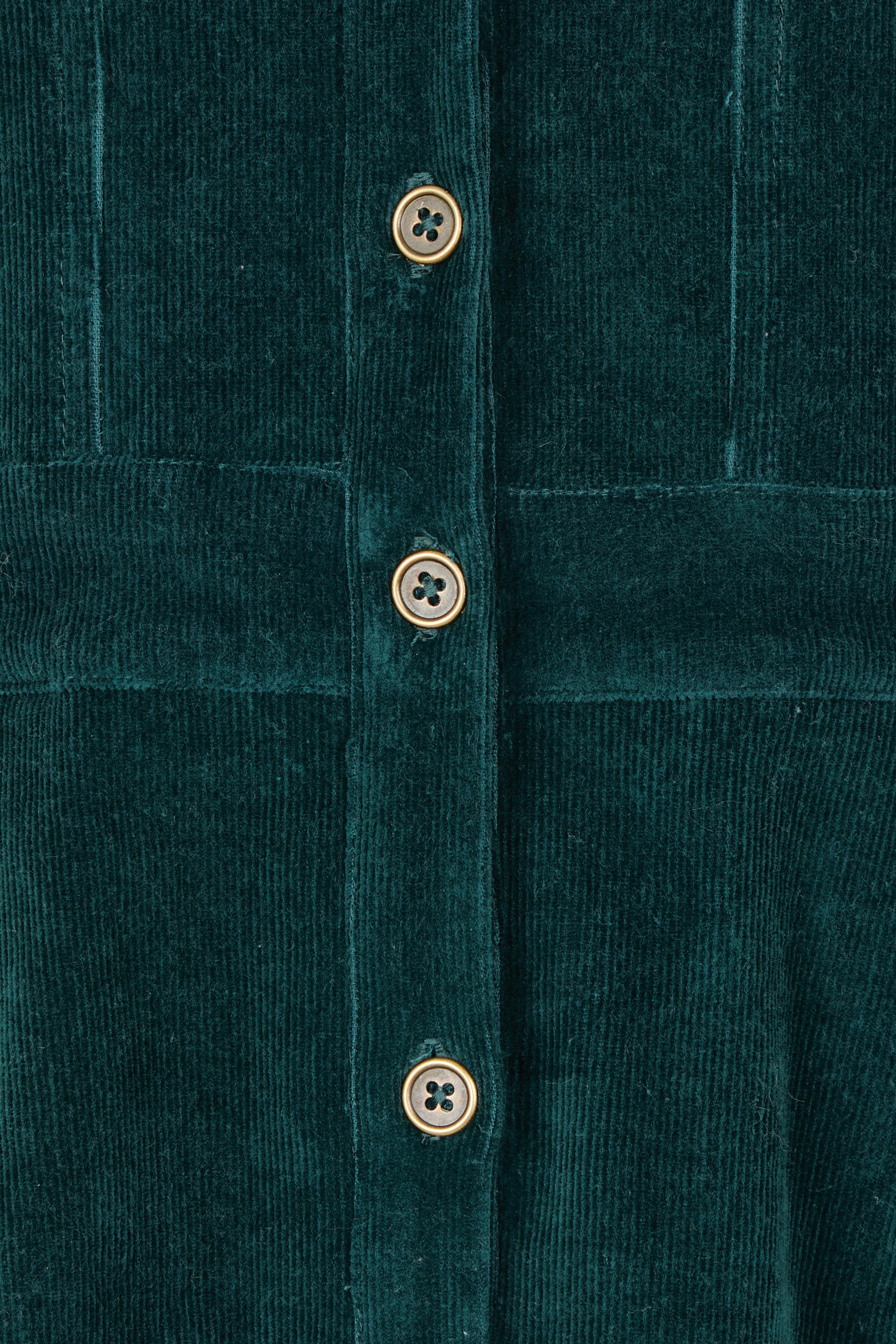 Product shot of the Cotton Corduroy Button Dress in colour Pine (Green), detail