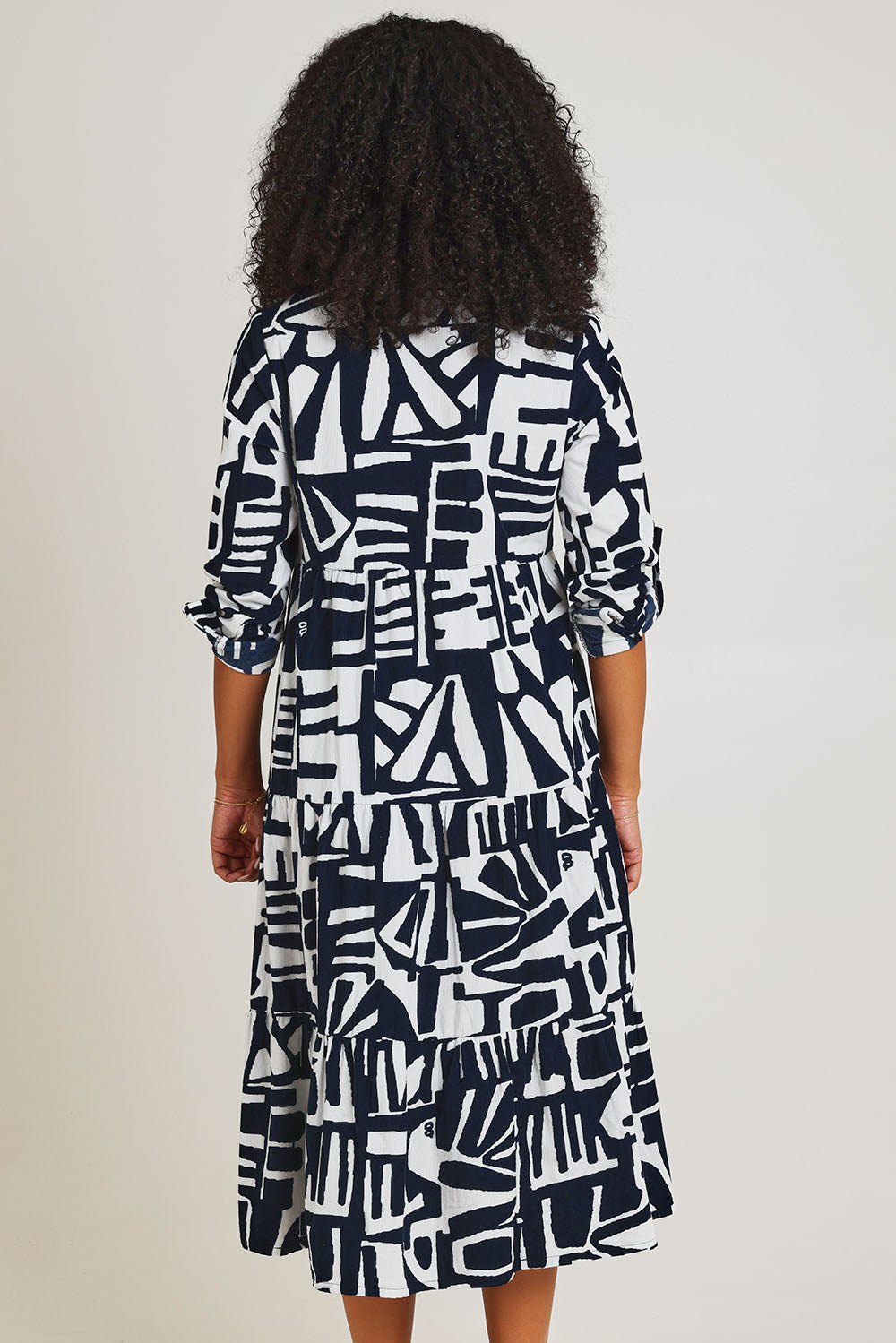 Model Ziara wearing size 10 of the Corduroy Cotton Collar Dress in colour Navy (Blue), from the back