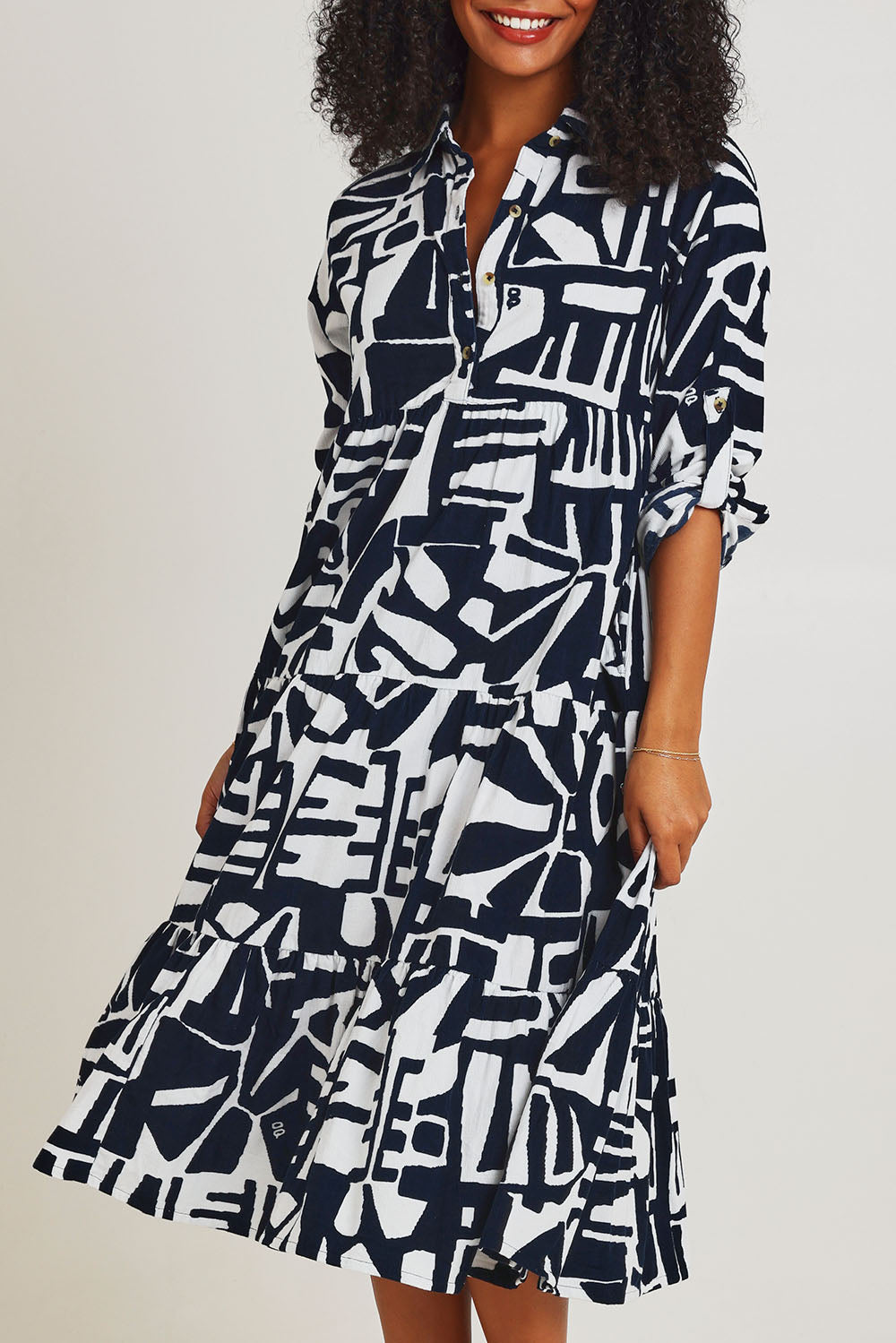 Model Ziara wearing size 10 of the Corduroy Cotton Collar Dress in colour Navy (Blue), from the front, cropped image