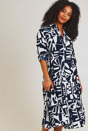 Model Ziara wearing size 10 of the Corduroy Cotton Collar Dress in colour Navy (Blue), from the front, cropped image
