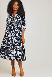 Model Ziara wearing size 10 of the Corduroy Cotton Collar Dress in colour Navy (Blue), from the front, showing the whole outfit