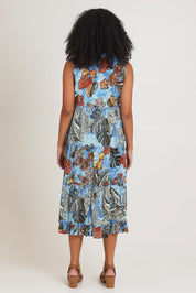 Model Ziara wearing size 10 of the Cotton Sleeveless Layers Dress in colour Lima (Blue), from the back