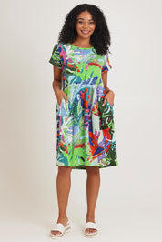 Model Ziara wearing size 10 of the Short Sleeve Bubble Cotton Dress in colour Leavesblue, from the front, showing the whole outfit