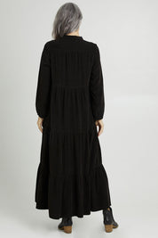 Model Luisa wearing size 10 of the Essentials Cord Layered Maxi Dress in colour Black (Black), from the back