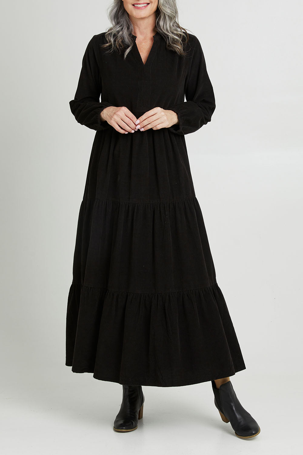 Model Luisa wearing size 10 of the Essentials Cord Layered Maxi Dress in colour Black (Black), from the front, cropped image