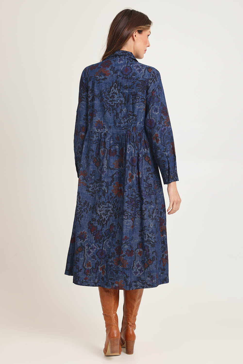 Model Madeline wearing size 10 of the Midi Collar Dress in colour Tabriz (Blue), from the back