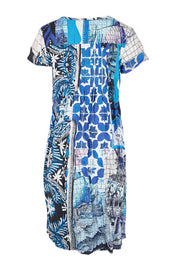 Product shot of the Easy Fit Cotton Dress – Print in colour Print, from the back
