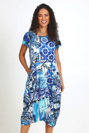 Model Pamelar wearing size 10 of the Horseshoe Bubble Dress – Print in colour Print, from the front