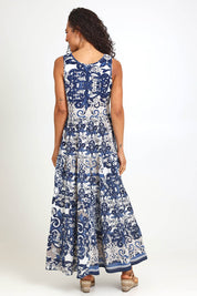 Model Pamelar wearing size 10 of the Sleeveless Knit Top Dress – Print in colour Print, from the front