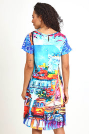 Model Pamelar wearing size 10 of the V-Contemporary Dress – Lisbon in colour Lisbon, from an angle
