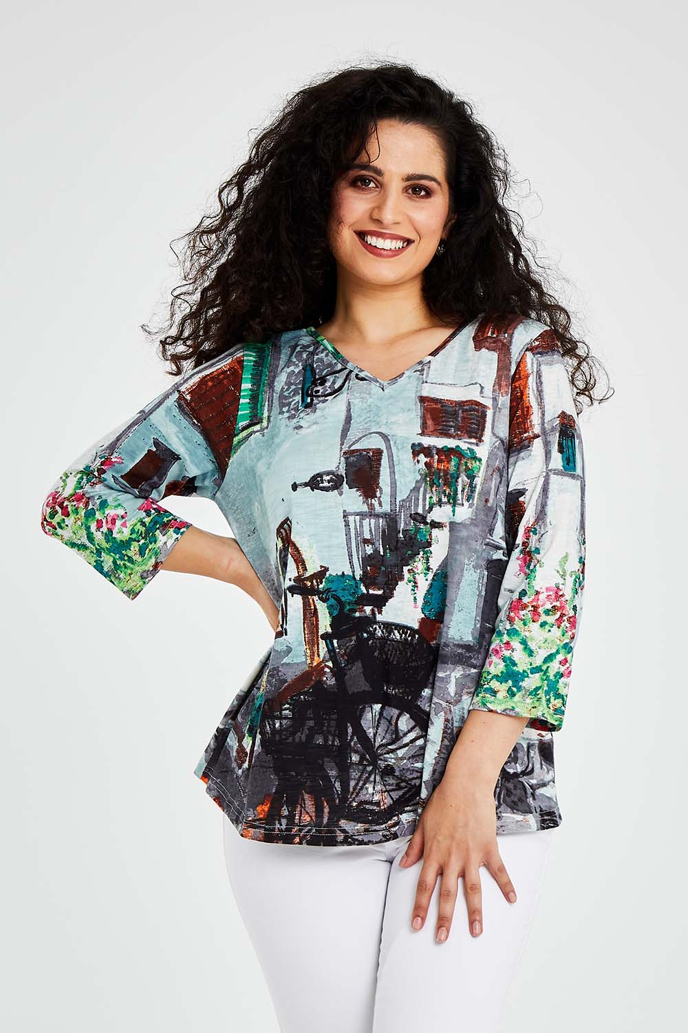 Model Bernadette wearing size 10 of the Tuscany Organic Cotton 3/4 Sleeve Tin colourShirt Contemporary - Tuscany (Blue), from the front, cropped image