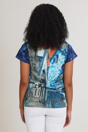 Model Ziara wearing size 10 of the Cotton Crew Contemporary Tin colourShirt - Towerblue, from the back