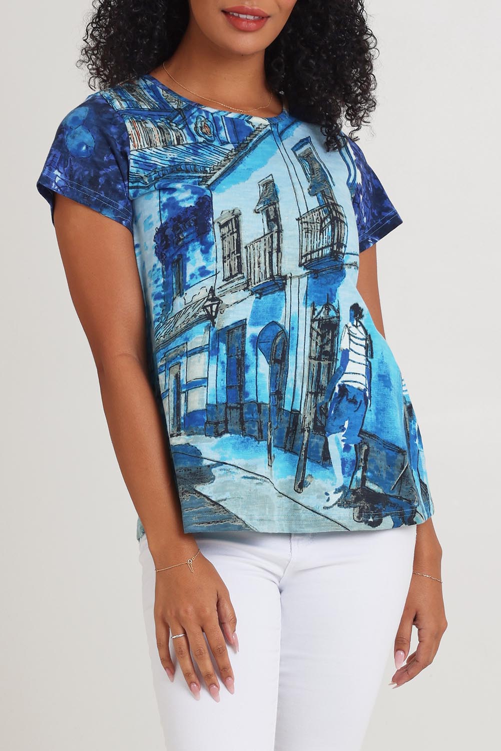 Model Ziara wearing size 10 of the Cotton Crew Contemporary Tin colourShirt - Towerblue, from the front, cropped image